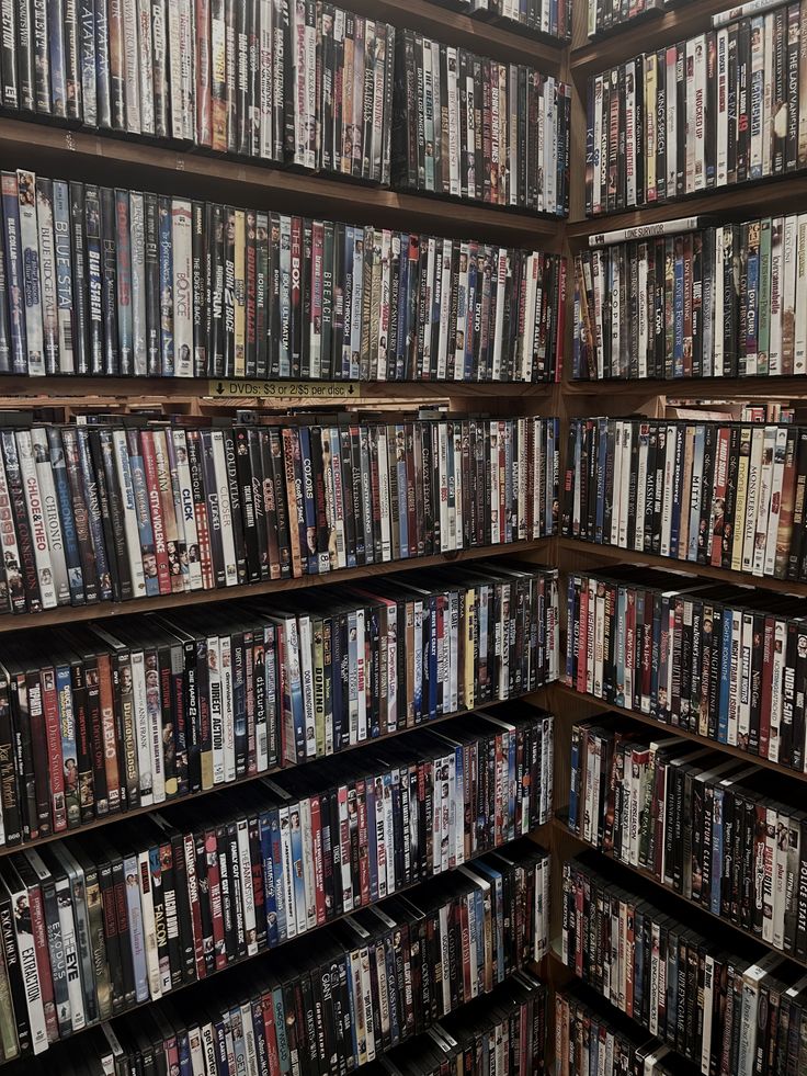 DVD and Blu-ray movie cases arranged on shelves
